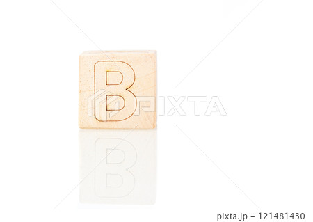 Wooden cubes with letters B on a white background 121481430