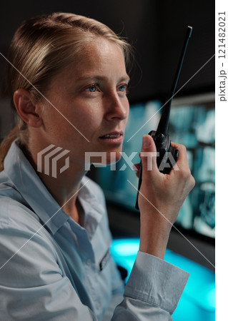 Speaking in walkie-talkie in office Speaking in walkie-talkie in office 121482021