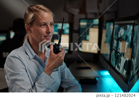 Female officer of surveillance room 121482024