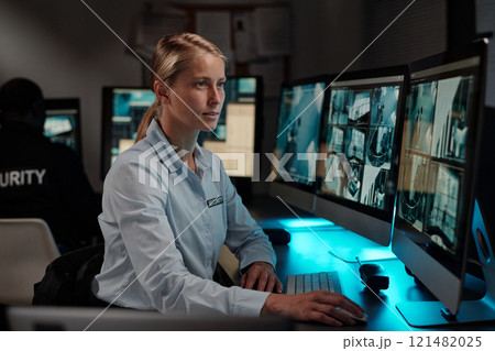 Blond female security guard in uniform Blond female security guard in uniform 121482025