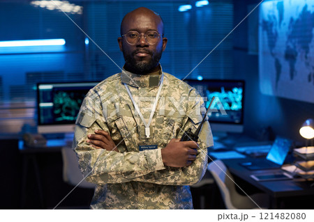 Serious officer in camouflage uniform 121482080