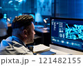 Officer looking at computer screen 121482155