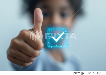 Child showing thumbs up approval, symbol of honesty and trust check sign 121483456