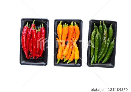 Chili peppers on a white background. Chili peppers on a white background. 121484870