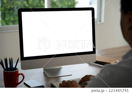 man working Businessman using a desktop computer of the blank screen with hands man working Businessman using a desktop computer of the blank screen with hands 121485745