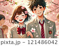 桜の中で記念撮影する小学生 121486042