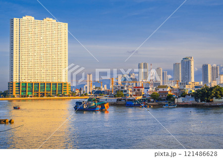 View of the Kai River with fishing boats in the Asian city of Nha Trang, Vietnam View of the Kai River with fishing boats in the Asian city of Nha Trang, Vietnam 121486628