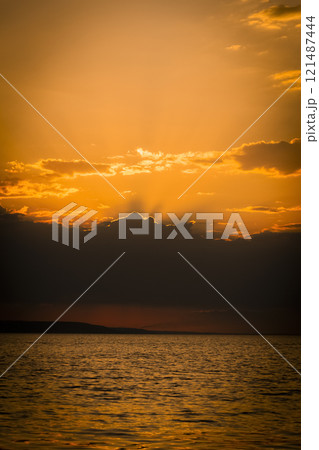 Sunset at the sea 121487444