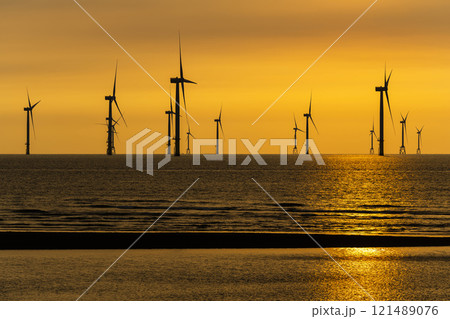 Sunset view of the Offshore wind power systems off the western coast of Taiwan. Sunset view of the Offshore wind power systems off the western coast of Taiwan. 121489076