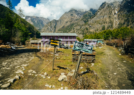 A sign for Khumjung Gomba at Pheriche, on the Mount Everest Base camp trail, Nepal Himalaya 121489449