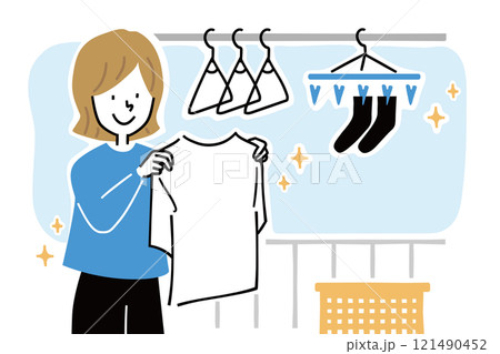 ベランダで洗濯物を干す女性のイラスト 121490452