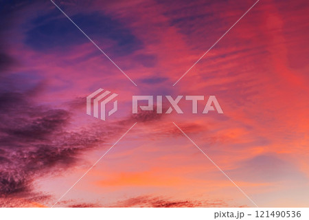 Pink clouds at sunset in beautiful blue sky in...の写真素材 [121490536] - PIXTA
