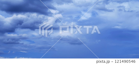 blue sky with blue rainy clouds on background. Panorama of the sky 121490546