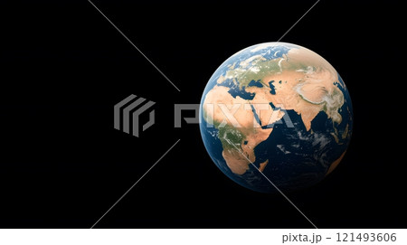 Rotating Earth with sunrise casting light on continents, clouds visible 121493606