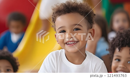 Children of different cultures playing together in a colorful playground 121493763
