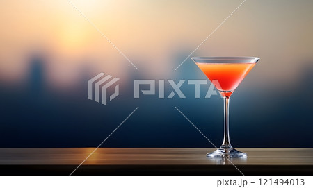Exotic cocktail with layers of vivid colors in a martini glass on a polished bar, perfect for summer evenings Exotic cocktail with layers of vivid colors in a martini glass on a polished bar, perfect for summer evenings 121494013