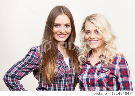 Portrait adult daughter with mother. Portrait adult daughter with mother. 121494847