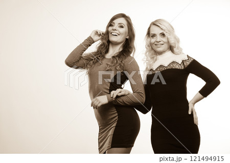 Adult mother and daughter portrait 121494915