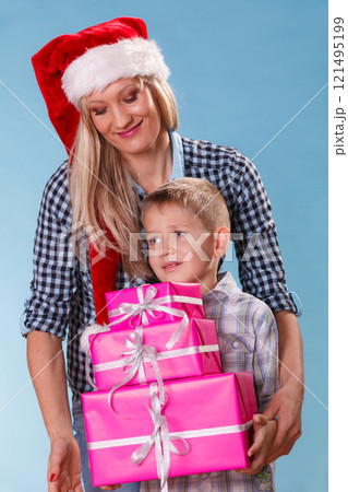 Mother and son with gift boxes Mother and son with gift boxes 121495199