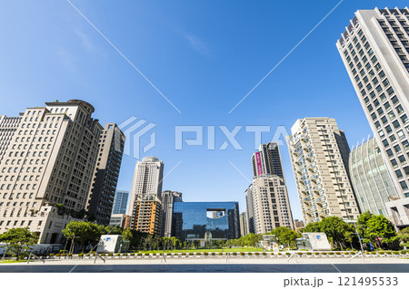 View of the park and surrounding modern buildings in front of Taichung City Council, Taiwan. 121495533