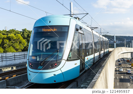A train traveling on the Danhai Light Rail transit (LRT) in New Taipei City, Taiwan. 121495937