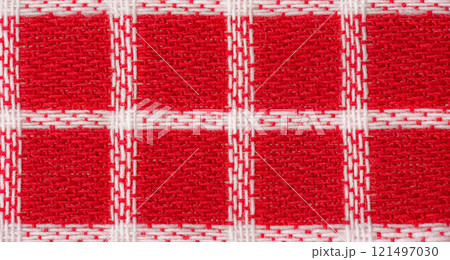 Red and white checkered fabric as a background Red and white checkered fabric as a background 121497030