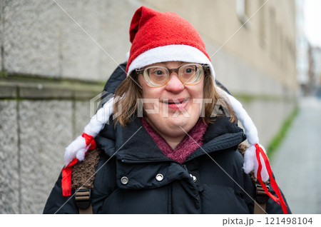 Outdoor portrait of a 42 yo Down Syndrome woman...の写真素材 [121498104] - PIXTA