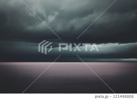 Black rain clouds float above the sea, ominous.AI Generated 121498808