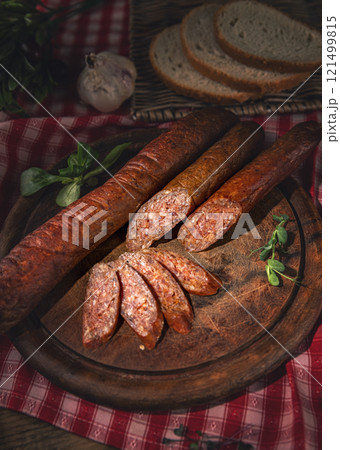 Traditional homemade sausages seasoned with herbs Traditional homemade sausages seasoned with herbs 121499815