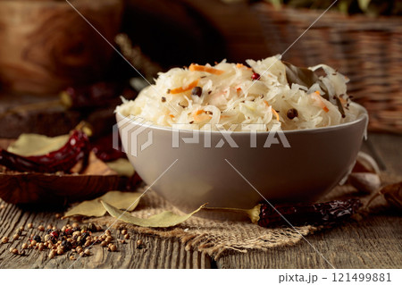 Traditional German sauerkraut on a old rustic wooden table. 121499881
