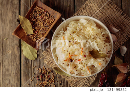 Traditional German sauerkraut on a old rustic wooden table. 121499882