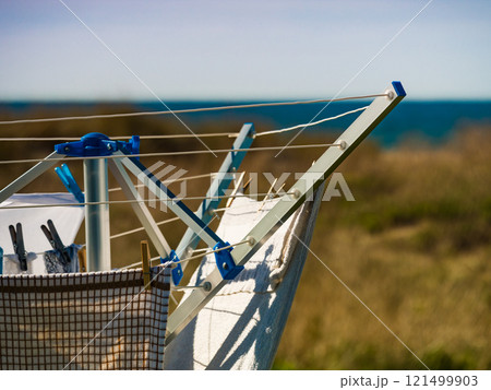 Clothes hanging to dry outdoor 121499903