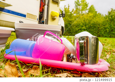 Clean dishes drying on fresh air, camping outdoor Clean dishes drying on fresh air, camping outdoor 121499915