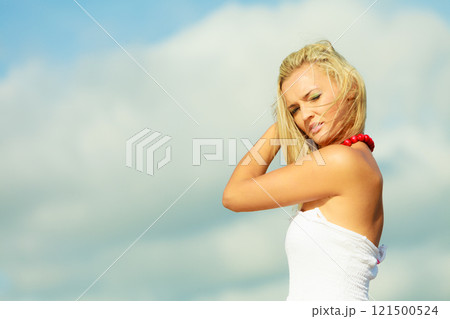Beauty blonde woman portrait on sky background. 121500524