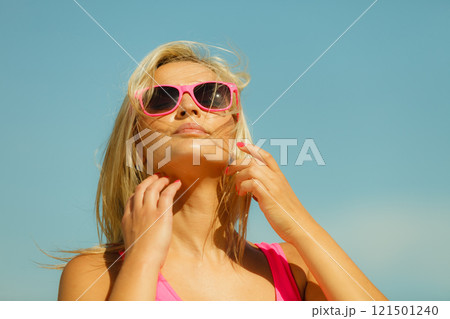 Young girl on beach. 121501240
