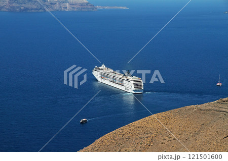 Picturesque view on Santorini volcano caldera and bay whith a cruise ship in Aegean Sea. Picturesque view on Santorini volcano caldera and bay whith a cruise ship in Aegean Sea. 121501600