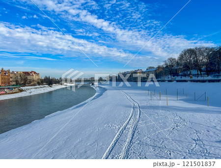 Panoramic winter landscape view with the blue sky on the banks of the San river at Przemysl, Poland  121501837