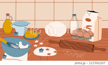 A kitchen table with baking ingredients. Home-made cookies, bread and cakes. A kitchen table with baking ingredients. Home-made cookies, bread and cakes. 121502207