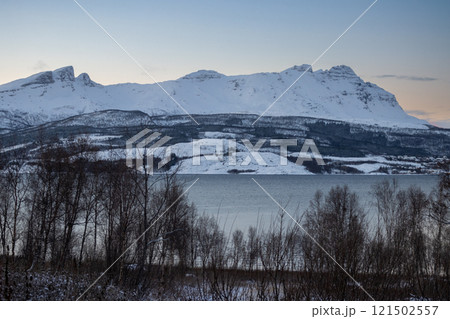 Fjord and early evening landscape, Norway 121502557