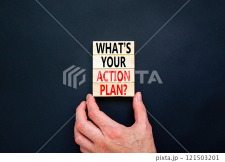 Action plan symbol. Concept words What is your action plan on beautiful wooden blocks. Beautiful black table black background. Businessman hand. Business What is your action plan concept. Copy space 121503201