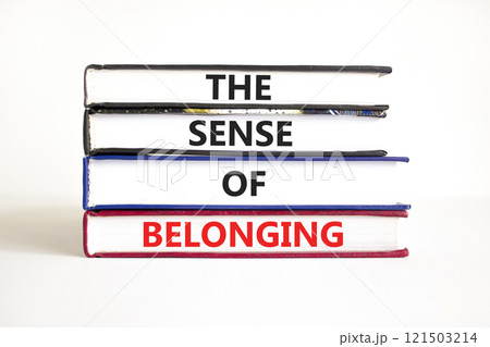 The sense of belonging symbol. Concept words The sense of belonging on beautiful books. Beautiful white table white background. Business and the sense of belonging concept. Copy space. 121503214