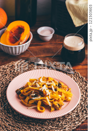 Tagliatelle Pasta with Creamy Pumpkin Sauce and Mushrooms 121503603