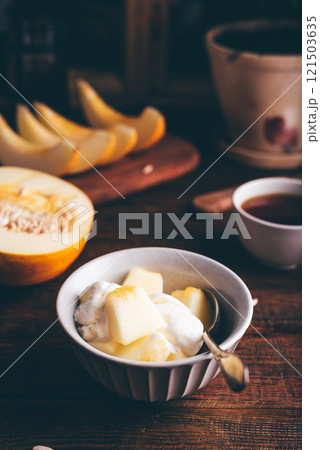 Dessert of Ice Cream Mixed with Chopped Melon Dessert of Ice Cream Mixed with Chopped Melon 121503635