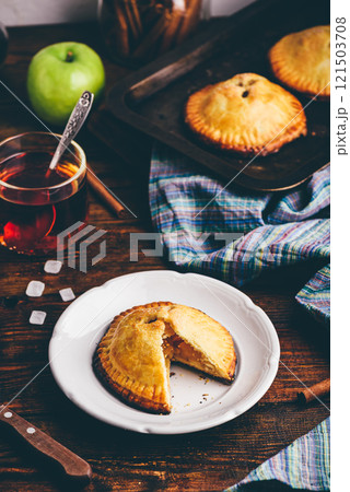 Homemade apple mini pies 121503708