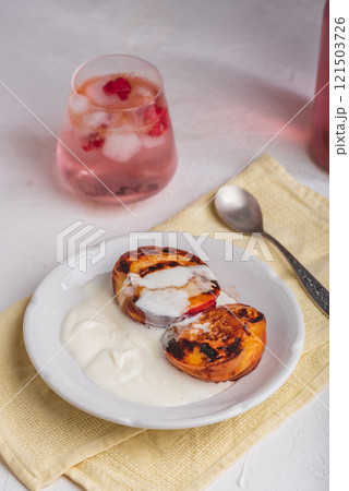 Roasted peaches with honey Roasted peaches with honey 121503726
