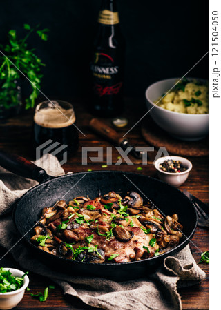 Fried pork neck steak with different mushrooms 121504050