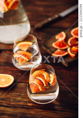 Water infused with red oranges Water infused with red oranges 121504294