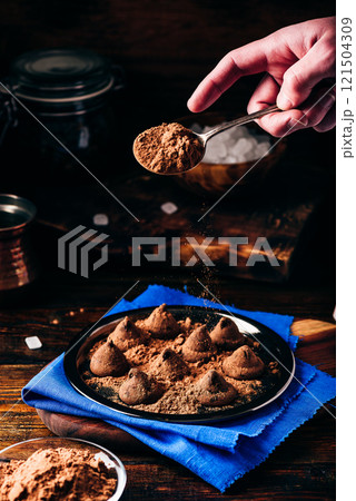 Homemade truffles with dark chocolate Homemade truffles with dark chocolate 121504309