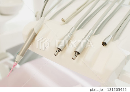 Dental tools,drill top view teal glow Dental tools,drill top view teal glow 121505433