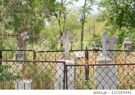 Abandoned graves in a cemetery 121505445